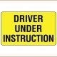 Driver Under Instruction Sign